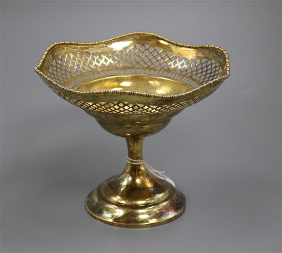 A George V pierced silver gilt comport by Charles Boyton & Sons, engraved with barons coronet, London, 1913, 5.5 oz.